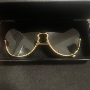 VERSACE SUNGLASSES. With very small scratches,Comes with case and duster.